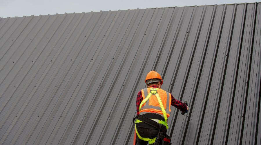 Professional metal roof installation services in Plover, IA